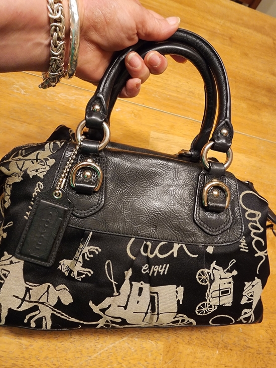 Coach Ashley Horse and Carriage satchel bag featuring a black 